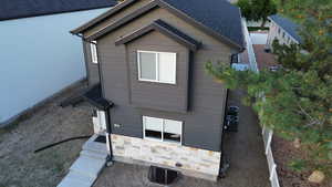 View of front of property with stone siding