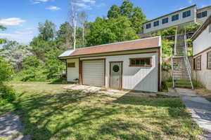 Shed/1 car garage with electricity.