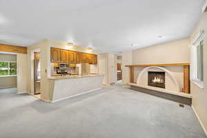 Family room off of kitchen with fireplace