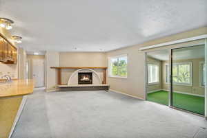 Sunroom on the right off of family room.