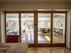 Doorway to sunroom, They slide out of the way, healthy amount of natural light.