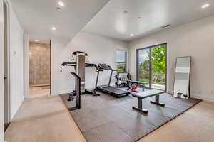 Exercise room with carpet, recessed lighting, and baseboards