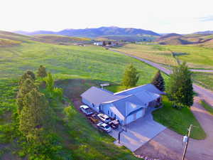 Aerial view of sparsely populated area with a mountainous background