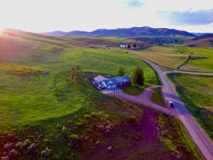 Aerial view of sparsely populated area featuring a mountain backdrop