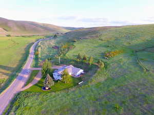Aerial overview of property's location featuring mountains and rural landscape