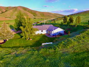 View of subject property with mountains
