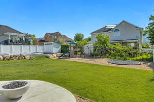 View of yard featuring a playground and a residential view