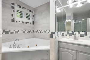 Indulge yourself and take a Luxurious Soak in this Lovely Jetted Tub at the end of the day! Also features a Linen Closet and Walk-in Closet!
