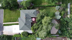 Bird's Eye View of this Special Property! This Yard has it all...Wooded Trees with Shady Paths, Sports Court, Open Flat Grass to Run and Play on, Fully Fenced to keep Kids and Pets in Safely!