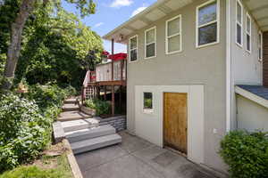 Rear View with door to Walkout, Lower Patio and steps to your Lovely Deck!