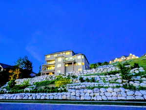 View of property at twilight