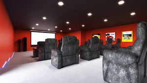Carpeted cinema room with recessed lighting
