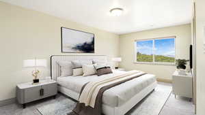 Bedroom with light carpet and baseboards