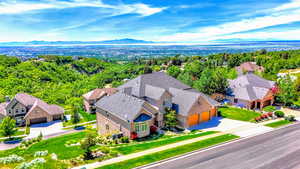 View of subject property featuring mountains
