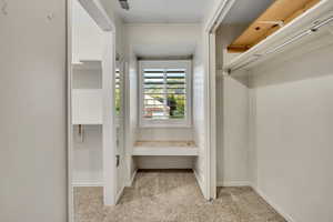 View of walk in closet