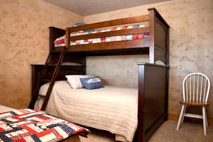 Bedroom featuring carpet