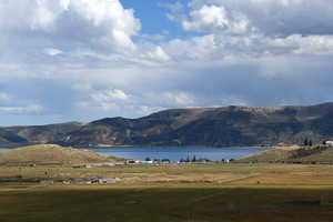 Mountain view featuring a large body of water