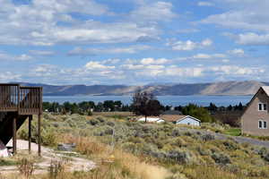 View of mountain backdrop with a nearby body of water