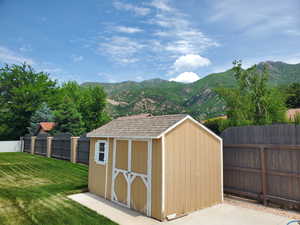 View of shed with a mountain view