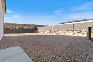 View of fenced backyard
