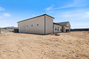 Rear view of house featuring a mountain view