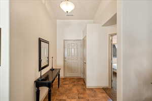 Foyer featuring baseboards