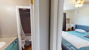 Bedroom featuring a sink