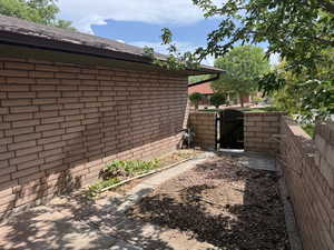 View of yard featuring a gate