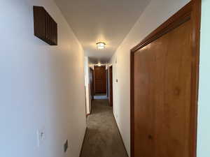 Corridor with carpet floors