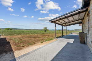 View of patio / terrace with a view of countryside
