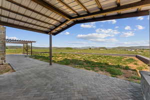 View of patio / terrace with a mountain view
