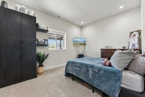Bedroom featuring carpet, recessed lighting, and baseboards