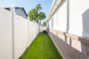 View of yard featuring central AC unit