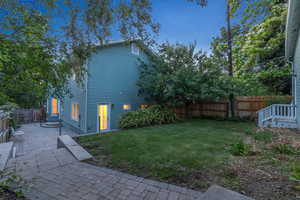 View of side of property with a patio area