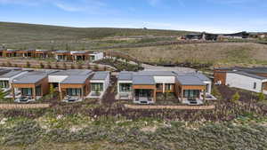 Aerial view of residential area with a mountainous background