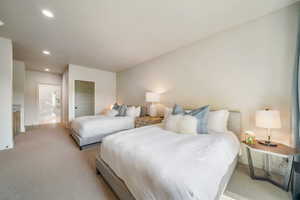 Bedroom featuring carpet floors, recessed lighting, and baseboards