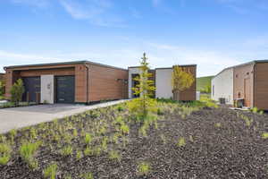View of outbuilding featuring central air condition unit