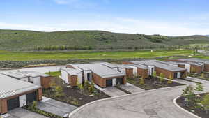 Mountain view featuring a local golf course