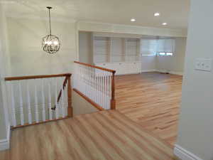 Stairway and entrance into spacious family room on main floor