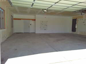 Three-car garage with a garage door opener