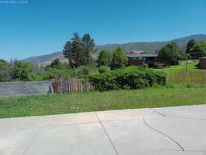 View of backyard with a mountain view