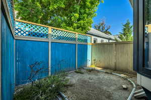 Small, private yard ready for your green thumb.