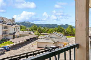 View of mountain background featuring nearby suburban area