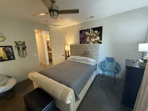 Bedroom featuring baseboards and ceiling fan