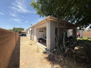 View of property exterior with stucco siding
