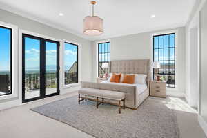 Carpeted bedroom with access to exterior, ornamental molding, and recessed lighting