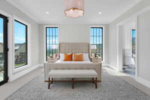 Carpeted bedroom with crown molding, baseboards, and recessed lighting