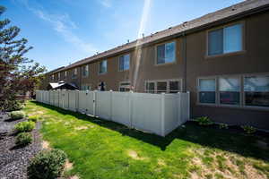 Back of property with stucco siding