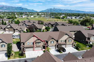 Aerial view of residential area with a mountainous background