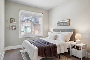 Carpeted bedroom with baseboards
